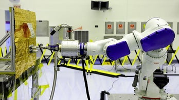 NASA eyes robotic space gas stations for satellites