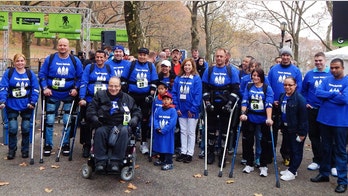 The bionic bunch: Largest gathering ever of exoskeleton-wearers walk for charity