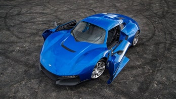 The Rezvani Beast Alpha coupe has the craziest doors you'll see today