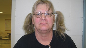 FBI: Woman robbed Wyoming bank to return to prison