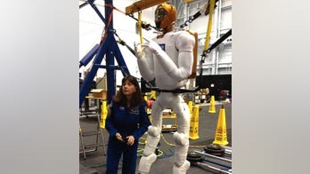 Space station's resident robot receives delivery of legs