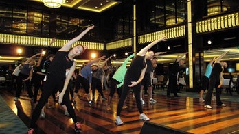 A cruise ship fitness class designed by Rockettes