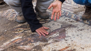 Rare Roman mosaic, featuring toga-wearing figures, discovered in Israel