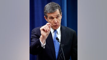 Democratic NC governor-elect threatens to sue over GOP bills to limit his powers