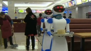 Chinese restaurant owner ditches human waiters for robots