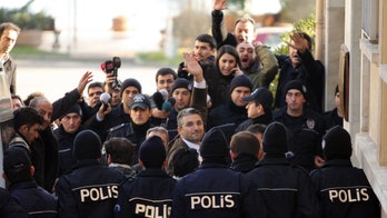 Turkish journalist detained over social media postings, others stand trial