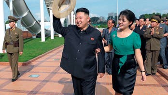 Kim Jong Un's cheerleading wife rises in ranks to achieve first lady title