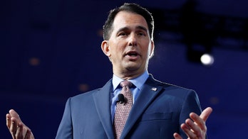 Wisconsin's GOP governor warns of 'Blue Wave' as liberal wins court seat