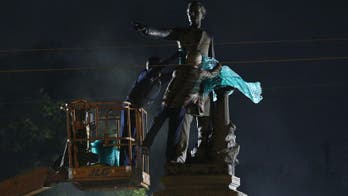Amid protests, Jefferson Davis statue comes down in New Orleans
