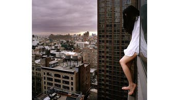 Daring photographer creates self-portraits from heart-racing heights