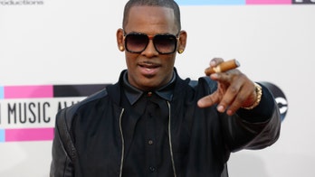 R. Kelly sued by Mississippi deputy over alleged affair with man's wife