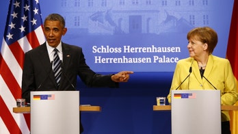 Obama calls to 'keep moving forward' on trade deal during Germany visit