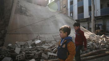 Hundreds flee fighting near Syria's capital despite truce