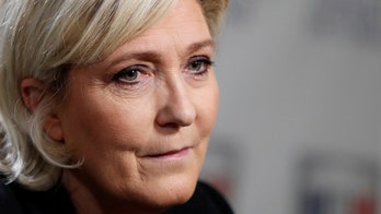 French far-right leader Marine Le Pen charged over sharing brutal ISIS photos