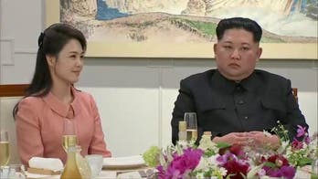 Kim Jong Un shoves photographer out of way of wife, Ri Sol Ju, at Korean summit, video shows