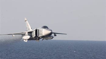 Russia flying more armed aircraft over US bases in Syria, US CENTCOM commander says