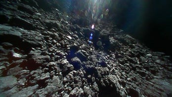 Asteroid rovers send back stunning new pictures of space rock's surface