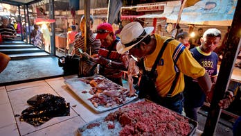 Venezuelans turn to spoiled meat amid months of power outages, economic turmoil