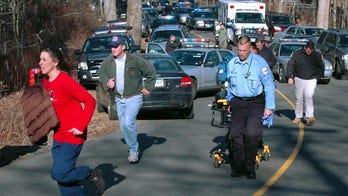 College officially fires professor who questioned Sandy Hook