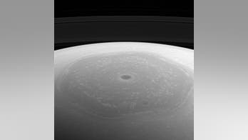 Bizarre Saturn hexagon, vortex star in Cassini photo