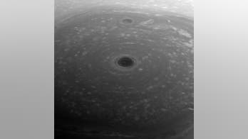 Cassini snaps Saturn's strange polar vortex during daring dive