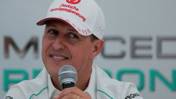 F1 star Schumacher still waking up from coma