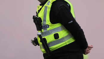 Scotland police seek driver accused of ramming car into officers
