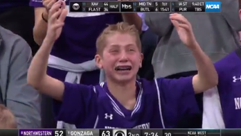 Emotional young Northwestern fan becomes instant tourney highlight