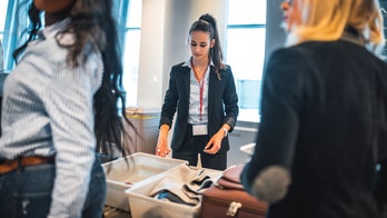 Security trays carry more viruses than anywhere else in airport, study finds