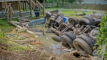 This stinks: Septic truck dives into backyard pool