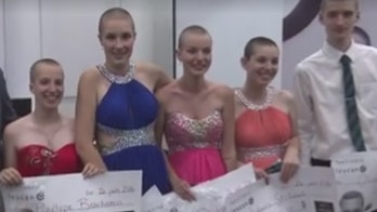 Teens shave their heads at prom for cancer patients