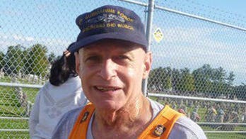 Running for their lives: Retired Navy man does marathons to honor fallen heroes