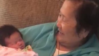 Grandmother with Alzheimer's sings Japanese children's song to infant granddaughter