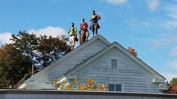 Roofers in Maine stop work to respect national anthem, flag
