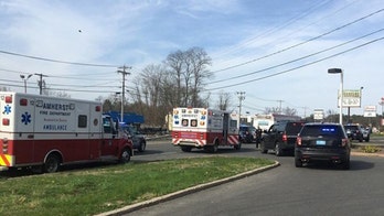 Woman slashes throats of 2 people in 'unprovoked attack' on bus