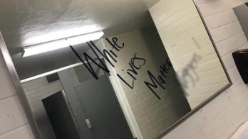 'Non-white' student linked to racist graffiti inside school, officials say