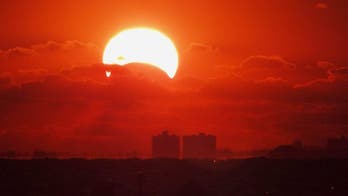 Rare solar eclipse wows skywatchers