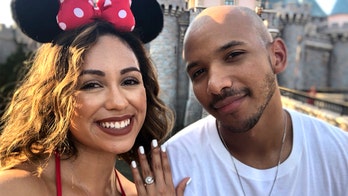 Woman flashes engagement ring on Disneyland's Space Mountain, goes viral