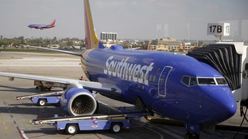 2 flight attendants hurt when Chicago-bound plane hits turbulence