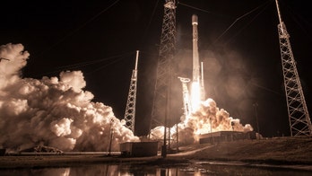 SpaceX says rocket performance OK in secret satellite launch