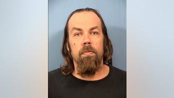 Man killed elderly woman, dressed up as her to cash checks, cops say