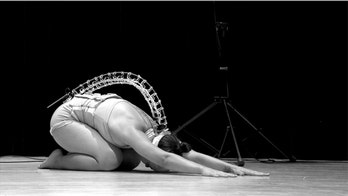 Wearable artificial spine plays music