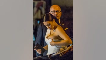 Kim Kardashian barely fits into dress at the opera