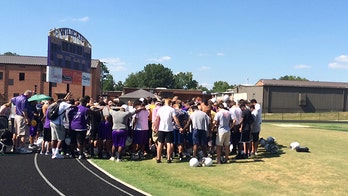 Church in hot water over football field baptism