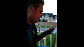 Man finds out wife is a match for life-saving kidney donation with special edition baseball card