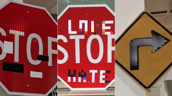 Autonomous car brains fooled by graffiti on street signs