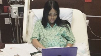 College student finishes her final exam while in labor