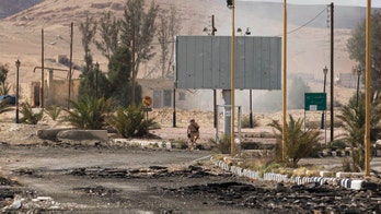 Syrian government team joins Geneva talks amid fighting in Aleppo