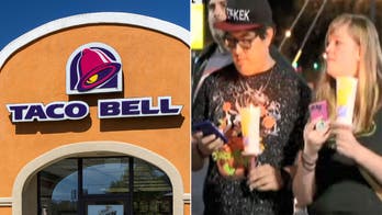 Taco Bell fans hold vigil to mourn restaurant destroyed in a blaze