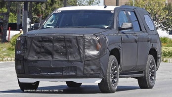 General Motors' 2014 full-size SUVs caught sneaking around